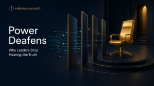 Dark blue stage scene showing a gold executive chair on a circular pedestal, facing gold-framed panels and glowing circuit lines, with the headline “Power Deafens: Why Leaders Stop Hearing the Truth.”