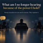 Conference room at night with a leader facing away from the camera; large headline reads, 'What am I no longer hearing because of the power I hold?' and a subheading beneath. Logo bottom right.